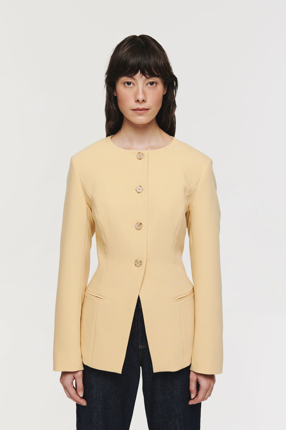 Aligne Daphne butter milk yellow nipped waist blazer with high round neck. 