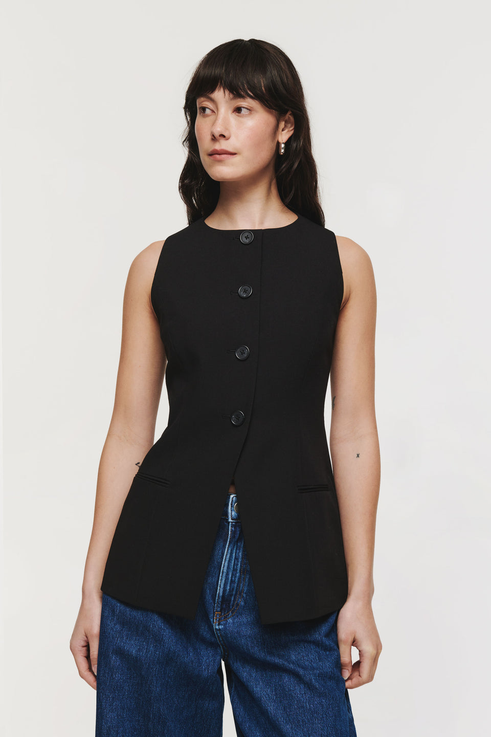 Leo is ALIGNE's contemporary take on a timeless, classic waistcoat. Designed for a longline fit, it has a high, slightly curved neckline and waisted silhouette. Wear with a pair of tailored trousers for a look that works for nights out – or with jeans for a more casual take.